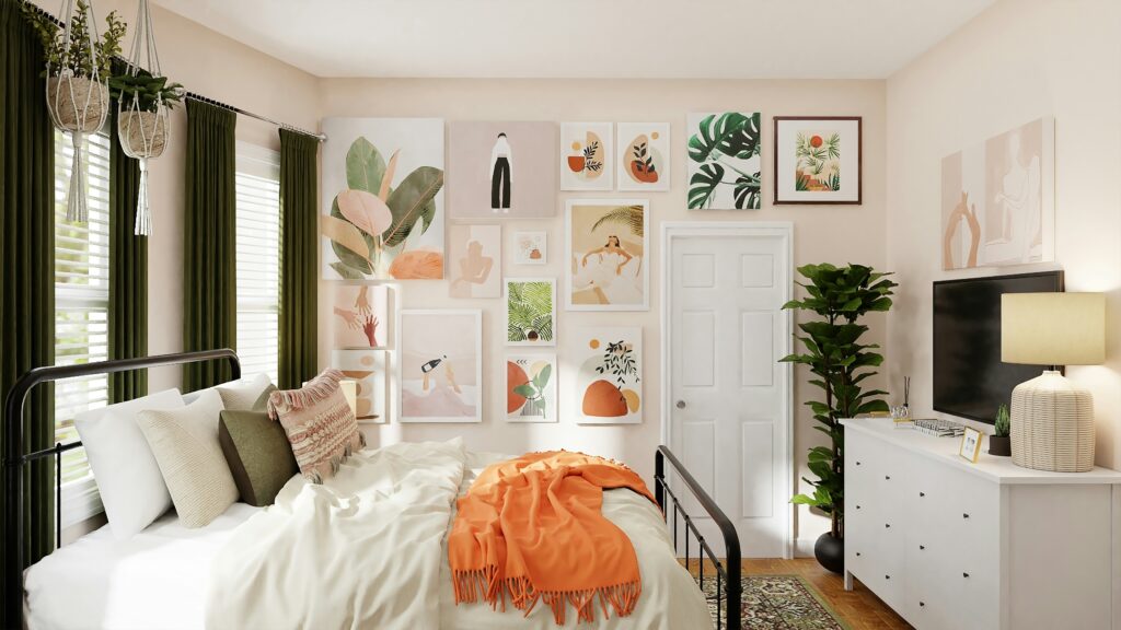 camera da letto con parete rosa pastello e complementi in tonalità verde e rosa