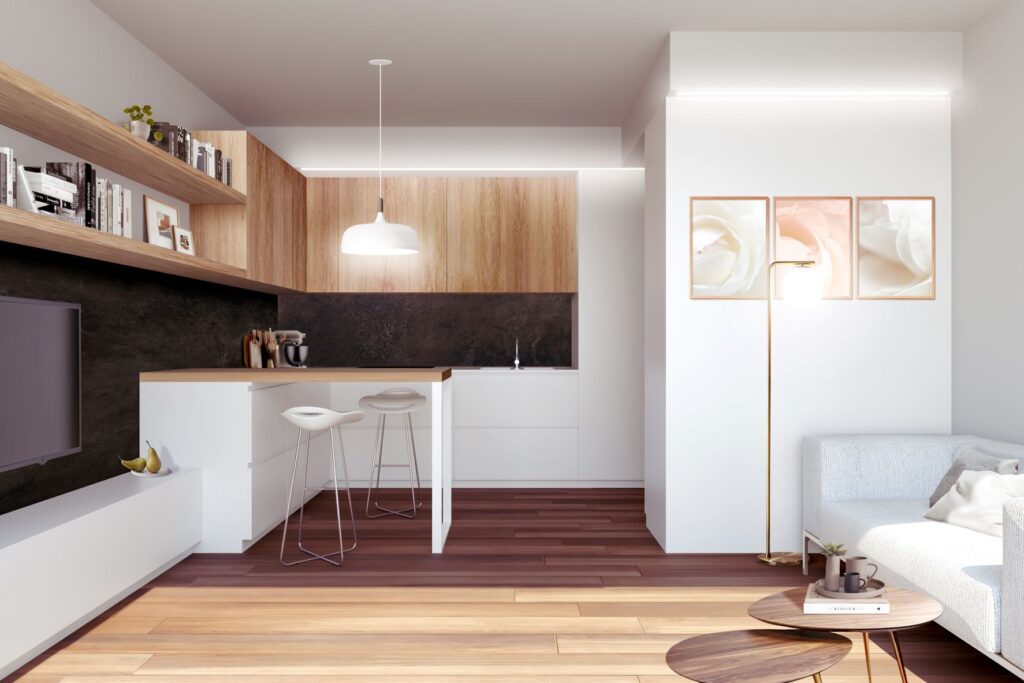 cucina e soggiorno in 30 mq in bianco, rovere e quarzo nero con dettagli oro
