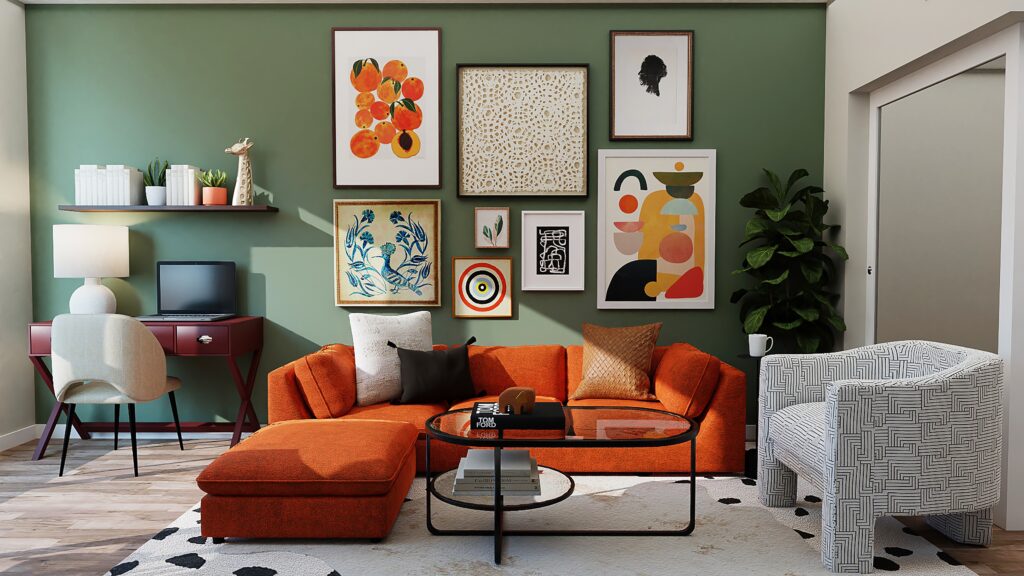 Divano in velluto arancione con quadri in stile eclettico e parete verde salvia